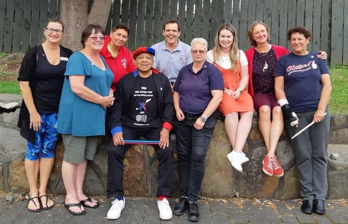 Ronnie Gardiner with group in NZ